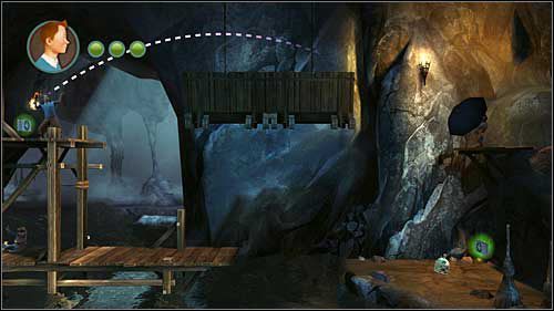 Zapaloną pochodnią rzuć ponad podwiązanymi kładkami - Rozdział 24 - W podmorskich jaskiniach (1) - Opis przejścia - Przygody Tintina: Gra Komputerowa - poradnik do gry