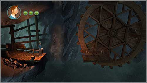 Przeskocz na kładkę obracającego się kołowrotu i poczekaj aż uniesie się ona wyżej - Rozdział 24 - W podmorskich jaskiniach (1) - Opis przejścia - Przygody Tintina: Gra Komputerowa - poradnik do gry