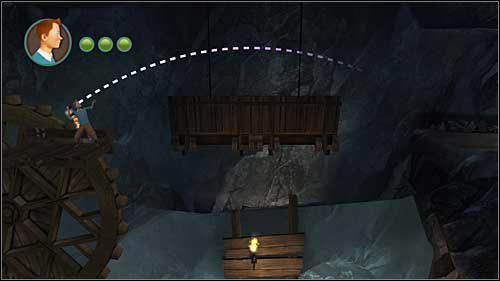 Z kołowrotu zeskocz w prawo i zabierz pochodnię, po czym wskocz z powrotem na kołowrót - Rozdział 24 - W podmorskich jaskiniach (1) - Opis przejścia - Przygody Tintina: Gra Komputerowa - poradnik do gry