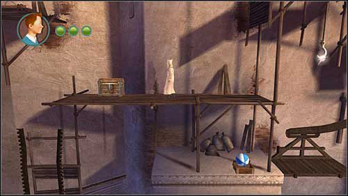 Po strąceniu piłką plażową worka i zawiśnięciu na haku, przeskocz w lewo do skrzyni - Rozdziały 19, 20 - Złote kraby - Przygody Tintina: Gra Komputerowa - poradnik do gry