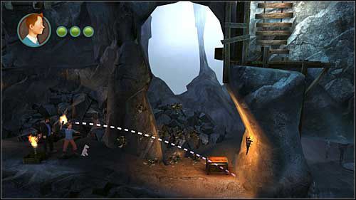 Po wysadzeniu pierwszej beczki idziesz w prawo i po chwili na ziemi leży druga skrzynka z pochodnią - Rozdział 24 - W podmorskich jaskiniach - Złote kraby - Przygody Tintina: Gra Komputerowa - poradnik do gry