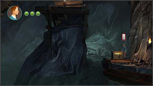 Po przeskoczeniu na drugi kołowrót będziesz musiał zeskoczyć z niego by zabrać pochodnię - Rozdział 24 - W podmorskich jaskiniach - Złote kraby - Przygody Tintina: Gra Komputerowa - poradnik do gry