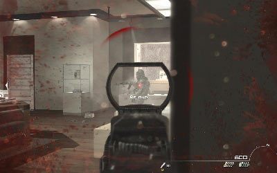 Kiedy dotrzecie na podwórze połóż rannego żołnierza przy kontenerze, po czym wejdź do budynku i oczyść go z wrogów - II- Blood Brothers | Opis przejścia gry | Call of Duty Modern Warfare 3 - Call of Duty: Modern Warfare 3 - opis przejścia i operacje specjalne - poradnik do gry