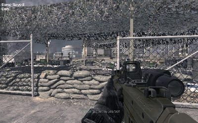 Wejdź na po schodach na górę, ukryj się za workami z piaskiem i wyeliminuj wszystkich wrogów w okolicy - III- Scorched Earth | Opis przejścia gry | Call of Duty Modern Warfare 3 - Call of Duty: Modern Warfare 3 - opis przejścia i operacje specjalne - poradnik do gry