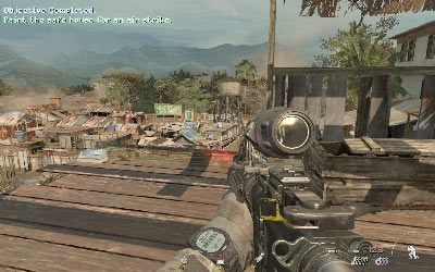 Po chwili dowództwo wskaże ci jeden z budynków (jest on losowy), który namierz laserem (wciśnij klawisz 4, a po wybraniu obiektu lewy przycisk myszy) i poczekaj, aż zostanie on zbombardowany - Fatal Extraction | Operacje Specjalne | Call of Duty Modern Warfare 3 - Call of Duty: Modern Warfare 3 - opis przejścia i operacje specjalne - poradnik do gry