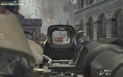 Wyjdź na ulicę, ukryj się za którymś z wraków z lewej i zacznij ostrzeliwać przeciwników na placu - Flood the Market | Operacje Specjalne | Call of Duty Modern Warfare 3 - Call of Duty: Modern Warfare 3 - opis przejścia i operacje specjalne - poradnik do gry