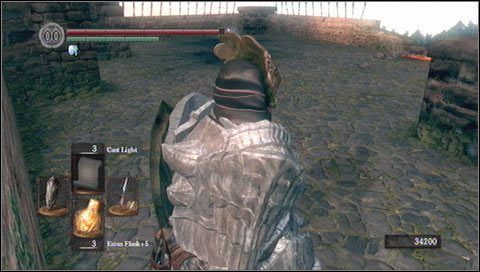 Gdy tylko dogaśnie ogień, ruszamy w stronę wyrwy w murze po prawej - Sens Fortress (4) | Opis przejścia Dark Souls - Dark Souls - poradnik do gry