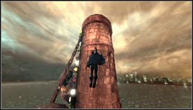 Pozostań w miejscu, w którym rozmawiałeś z Alfredem i obróć się w stronę dużego komina z przyczepionymi czaszkami #1 - Wejdź do huty Sionisa przez główny komin | Główny wątek Batman Arkham City - Batman: Arkham City - poradnik do gry