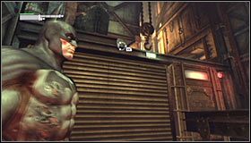 Z linii proponuję zejść dopiero wtedy, gdy znajdziesz się bezpośrednio za snajperem #1 - Znajdź Jokera w hucie | Główny wątek Batman Arkham City - Batman: Arkham City - poradnik do gry