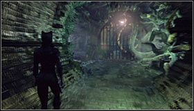 Możesz już zbliżyć się do studzienki kanalizacyjnej, przy której stali pokonani niedawno strażnicy TYGERA #1 - Dostań się do skarbca skonfiskowanych dóbr TYGERA | Misje Kobiety-Kota - Batman: Arkham City - poradnik do gry