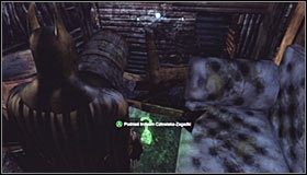 Załącz tryb detektywa, dzięki czemu zauważysz, że drewnianą przeszkodę można zniszczyć z pomocą wybuchowego żelu #1 - Park Row - Trofea Batmana (16-23) | Zagadki w Batman Arkham City - Batman: Arkham City - poradnik do gry