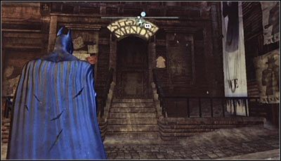 Odszukaj drzwi wejściowe do budynku, nad którymi widnieje napis Strange Minds (powyższy screen) i zeskanuj je - Park Row - Zagadki słowne | Zagadki w Batman Arkham City - Batman: Arkham City - poradnik do gry