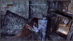 Zbliż się do miejsca ukrycia trofeum od północnej strony #1 i wespnij się na znajdującą się w tym miejscu bramkę #2 - Park Row - Trofea Kobiety-Kota | Zagadki w Batman Arkham City - Batman: Arkham City - poradnik do gry