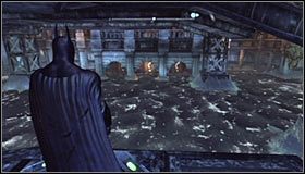 W celu dotarcia do miejsca ukrycia trofeum musisz zeskoczyć z autostrady i wylądować na niewielkiej platformie znajdującej się niedaleko wody #1 - Mila Rozrywki - Trofea Batmana (01-04) | Zagadki w Batman Arkham City - Batman: Arkham City - poradnik do gry