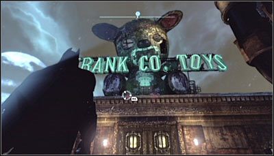 Zeskanuj niedźwiadka wraz z neonem widniejącym nad wejściem do budynku Krank Co - Mila Rozrywki - Zagadki słowne | Zagadki w Batman Arkham City - Batman: Arkham City - poradnik do gry