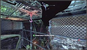 Skorzystaj teraz z umiejętności wspinania się po sufitach, a więc wciśnij klawisz F (lub przycisk RB na padzie) celem przyklejenia się do mostku #1 - Mila Rozrywki - Kamery TYGERA, Balony, Trofea Kobiety-Kota | Zagadki - Batman: Arkham City - poradnik do gry