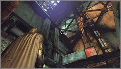 Rozpocznij w pomieszczeniu linii montażowej, stojąc na południowy-zachód od miejsca ukrycia trofeum - Huta - Trofea Batmana (01-09) | Zagadki w Batman Arkham City - Batman: Arkham City - poradnik do gry