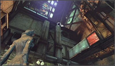 Rozpocznij w pomieszczeniu linii montażowej, stojąc na południe od miejsca ukrycia trofeum - Huta - Trofea Kobiety-Kota | Zagadki w Batman Arkham City - Batman: Arkham City - poradnik do gry