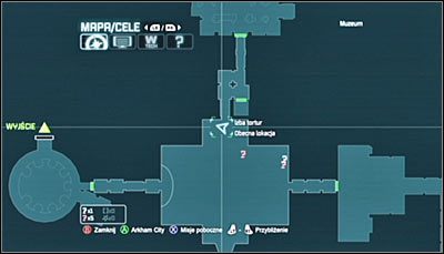 Rozpocznij na północny-zachód od miejsca ukrycia trofeum, a konkretnie na północnym balkoniku przylegającym do przejścia, które prowadzi do zbrojowni - Muzeum - Trofea Batmana (01-10) | Zagadki w Batman Arkham City - Batman: Arkham City - poradnik do gry