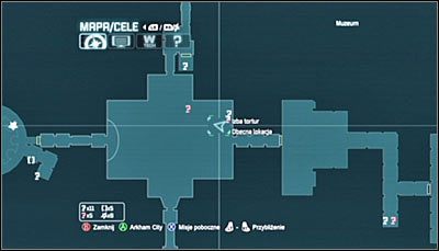 Miejsce, w którym należy dokonać skanowania zaprezentowane zostało na dwóch powyższych screenach - Muzeum - Zagadki słowne, Pingwiny | Zagadki w Batman Arkham City - Batman: Arkham City - poradnik do gry