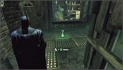 Zbadaj południowo-wschodni narożnik pomieszczenia fundamentów Wieży Cudów, a konkretnie jego najniższy poziom - Cudowne Miasto - Trofea Batmana (18-25) | Zagadki w Batman Arkham City - Batman: Arkham City - poradnik do gry