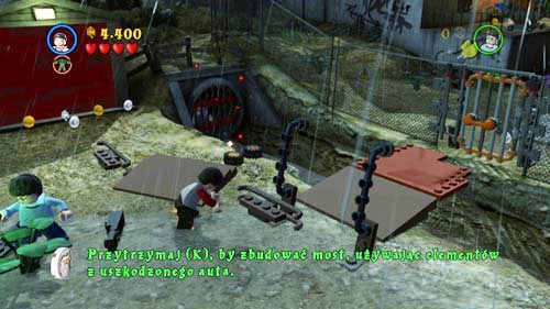 Podchodzimy do sterty klocków i za pomocą klawisza K budujemy most - Mroczne czasy (1) | Opis przejścia - Rok 5 | LEGO Harry Potter Lata 5-7 - LEGO Harry Potter: Lata 5-7 - poradnik do gry