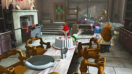 Na tort skusi się latający pod sufitem mikołaj w zamian oddając nam klamkę - Problemy stworka | Opis przejścia - Rok 5 | LEGO Harry Potter Lata 5-7 - LEGO Harry Potter: Lata 5-7 - poradnik do gry
