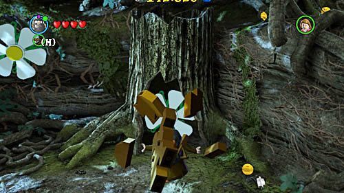 W pierwszych krokach musimy przełączyć się na Hagrida i zniszczyć konar pustego w środku pnia, ciągnąc za pomarańczowy uchwyt - Sekret Hagrida | Opis przejścia - Rok 5 | LEGO Harry Potter Lata 5-7 - LEGO Harry Potter: Lata 5-7 - poradnik do gry