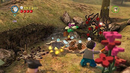 Ruszamy w prawo i rozsuwamy rośliny, przełączamy się na Kła, i kopiemy w dostępnym miejscu - Felix Felicis | Opis przejścia - Rok 6 | LEGO Harry Potter Lata 5-7 - LEGO Harry Potter: Lata 5-7 - poradnik do gry