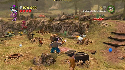 Idziemy w dół, zobaczymy obrócony do góry dnem kociołek, by go wyciągnąć z dziury musimy, przegonić trzy razy kreta, który na końcu wypchnie kociołek - Felix Felicis | Opis przejścia - Rok 6 | LEGO Harry Potter Lata 5-7 - LEGO Harry Potter: Lata 5-7 - poradnik do gry