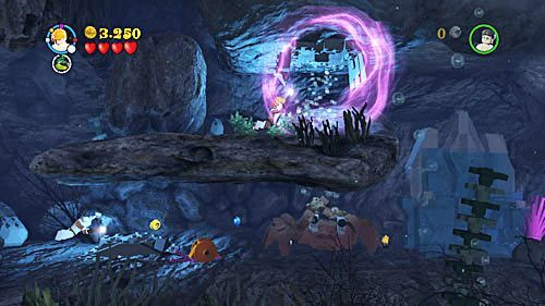 Na dole musimy jedną z postaci otworzyć gejzer, dzięki czemu druga przepłynie za skałę - Miecz i medalion | Opis przejścia - Rok 7 | LEGO Harry Potter Lata 5-7 - LEGO Harry Potter: Lata 5-7 - poradnik do gry