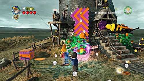 Wykopujemy z ziemi różową platformę i wyciągamy z torebki wielkiego rożka - Ekscentryczny pan Lovegood (1) | Opis przejścia - Rok 7 - LEGO Harry Potter: Lata 5-7 - poradnik do gry