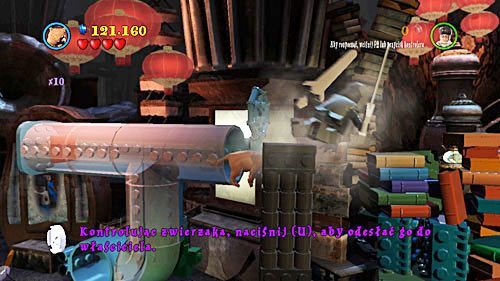 Rurociąg otworzy się z drugiej strony, przechodzimy tamtędy dzięki czemu, efektem domina przewrócą się wszystkie książki - Szatańska pożoga | Opis przejścia - Rok 7 | LEGO Harry Potter Lata 5-7 - LEGO Harry Potter: Lata 5-7 - poradnik do gry