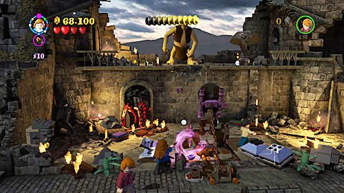 Korzystamy z torebki Hermiony i wyjmujemy klocki, z których składamy katapultę - Łzy Snapea | Opis przejścia - Rok 7 | LEGO Harry Potter Lata 5-7 - LEGO Harry Potter: Lata 5-7 - poradnik do gry