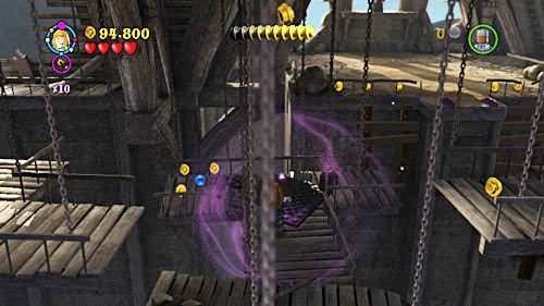 Kiedy trafimy na kolejną wyrwę, skaczemy na dół i budujemy z klocków wyskocznie dzięki czemu przedostajemy się na drugą stronę - Luka w planie | Opis przejścia - Rok 7 | LEGO Harry Potter Lata 5-7 - LEGO Harry Potter: Lata 5-7 - poradnik do gry