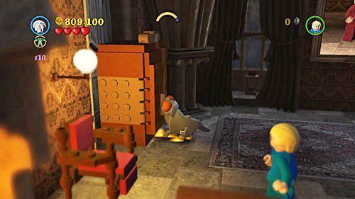 Kolejną część dostaniemy za oddanie czarodziejowi z obrazu czapki - Słuszna porcja | Znajdźki - Rok 6 | LEGO Harry Potter Lata 5-7 - LEGO Harry Potter: Lata 5-7 - poradnik do gry