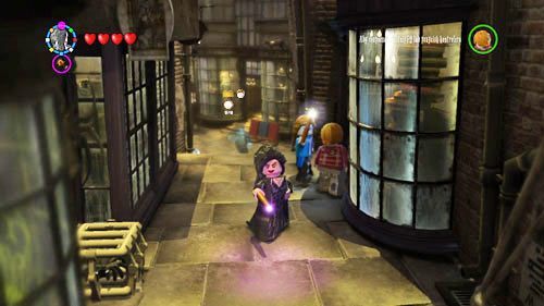 Ulica Śmiertelnego Nokturnu - w połowie ulicy znajdziemy klatki z pająkami, po ich zniszczeniu otrzymamy drugi szton Druga siostra ze Slytherinu - Dodatkowe sztony postaci - Londyn (2) | Dodatkowe znajdźki | LEGO HP Lata 5-7 - LEGO Harry Potter: Lata 5-7 - poradnik do gry