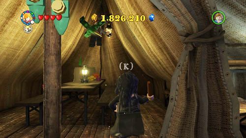 Rzeka (namiot) - w namiocie utknął uczeń którego możemy uwolnić przy pomocy światła z wygaszacza - Uczniowie w niebezpieczeństwie (1) | Dodatkowe znajdźki | LEGO HP Lata 5-7 - LEGO Harry Potter: Lata 5-7 - poradnik do gry