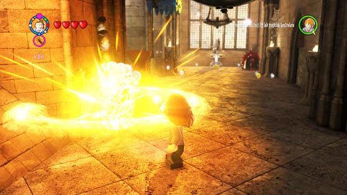 Korytarz siódmego piętra - na lewo od wejścia do pokoju życzeń znajdziemy ucznia uwięzionego w pajęczynie, należy strzelić z różdżki w ucznia, a zostanie uratowany - Uczniowie w niebezpieczeństwie (1) | Dodatkowe znajdźki | LEGO HP Lata 5-7 - LEGO Harry Potter: Lata 5-7 - poradnik do gry