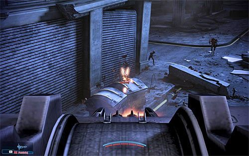 Po dotarciu na most łączący sąsiednie budynki czeka Cię krótki przerywnik wiążący się z korzystaniem ze stacjonarnego działka - Mass Effect 3: Priorytet - Ziemia #2 - solucja, opis przejścia - Mass Effect 3 - poradnik do gry