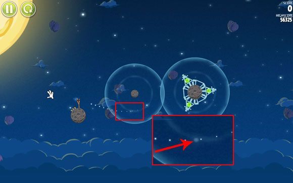 Po oddaleniu maksymalnie ekranu możesz wspomóc się niewielką gwiazdą widoczna w tle, przez którą przeprowadź trajektorię lotu ptaka - Level 1 - 12 | Pig Bang | Angry Birds Space - Angry Birds Space - poradnik do gry