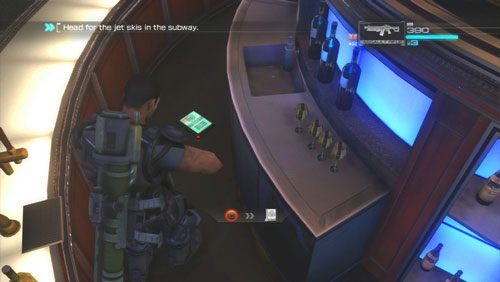 Aby odnaleźć Secur-Com należy przeskoczyć za owalny bar znajdujący się w samym środku pomieszczenia - Rozdział 2 | Bonusy (Secur-Com) Binary Domain - Binary Domain - poradnik do gry