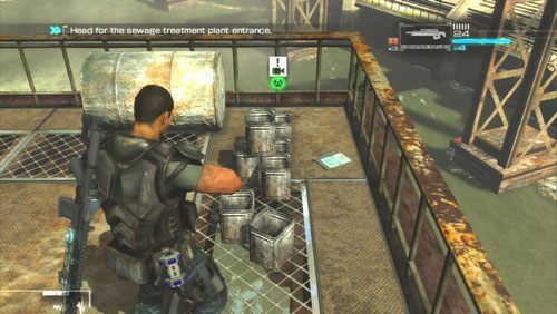 Na jej szycie znajdziemy Secur-Com ukryty za metalowymi pudełkami - Rozdział 2 | Bonusy (Secur-Com) Binary Domain - Binary Domain - poradnik do gry