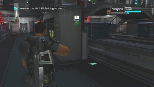 Gdy przejdziemy nad jednym z taśmociągów, korzystając z kładki, biegniemy przed siebie i mijamy schody by odnaleźć Secur-Com leżący pod drugą kładką - Rozdział 3 | Bonusy (Secur-Com) Binary Domain - Binary Domain - poradnik do gry