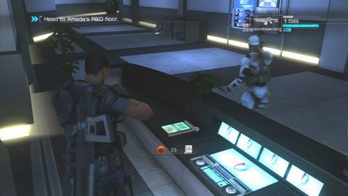 Uważnie obserwując lewą stronę znajdziemy biurko i leżący na nim Secur-Com - Rozdział 5 | Bonusy (Secur-Com) Binary Domain - Binary Domain - poradnik do gry