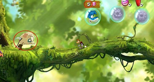 Przejście w prawo z pomieszczanie ze Starym mistrzem zaprowadzi Cię do mapy świata, w której wybierasz krainy, które chcesz odwiedzić - Chrapiące Drzewo Rayman Origins - Rayman Origins - poradnik do gry