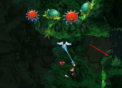 Korzystając z dalszych bujawek oraz skoczni znajdziesz ukryty Żalumek z M - Daj się ponieść (300 L, 2:10) | Pokręcona Dżungla | Rayman Origins - Rayman Origins - poradnik do gry