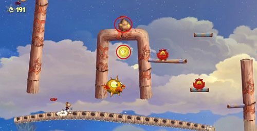 Przed drzwiami z okiem, znajdziesz Żalumek pod mostem, który zniszcz - Podniebna sonata (300 L, 2:50); Bez odwrotu (175 L) | Pustynia Dijirdów - Rayman Origins - poradnik do gry