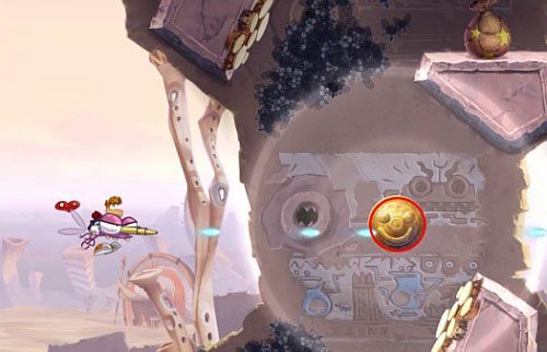 Dalej dotrzesz do lodowej części poziomu gdzie niszcz lodowe filary, by otrzymać dostęp do Żalumek - Nie strzelaj tyle (300 L); Rzępolony pościg | Pustynia Dijirdów | Rayman Origins - Rayman Origins - poradnik do gry