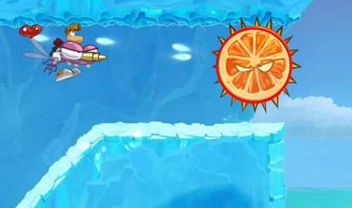 Na końcu poziomu, za drzwiami z okiem, czeka na Ciebie oczywiście klatka z E, którą zniszcz - Nie strzelaj tyle (300 L); Rzępolony pościg | Pustynia Dijirdów | Rayman Origins - Rayman Origins - poradnik do gry